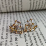 Open Heart Crystal Earrings with Clear Baguette Stones and Gold-Tone Details