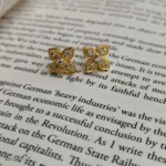 Gold-Toned Four-Petal Stone Stud Earrings - Image 2