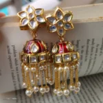 Star stone studded Red Jhumka with Drop Pearls
